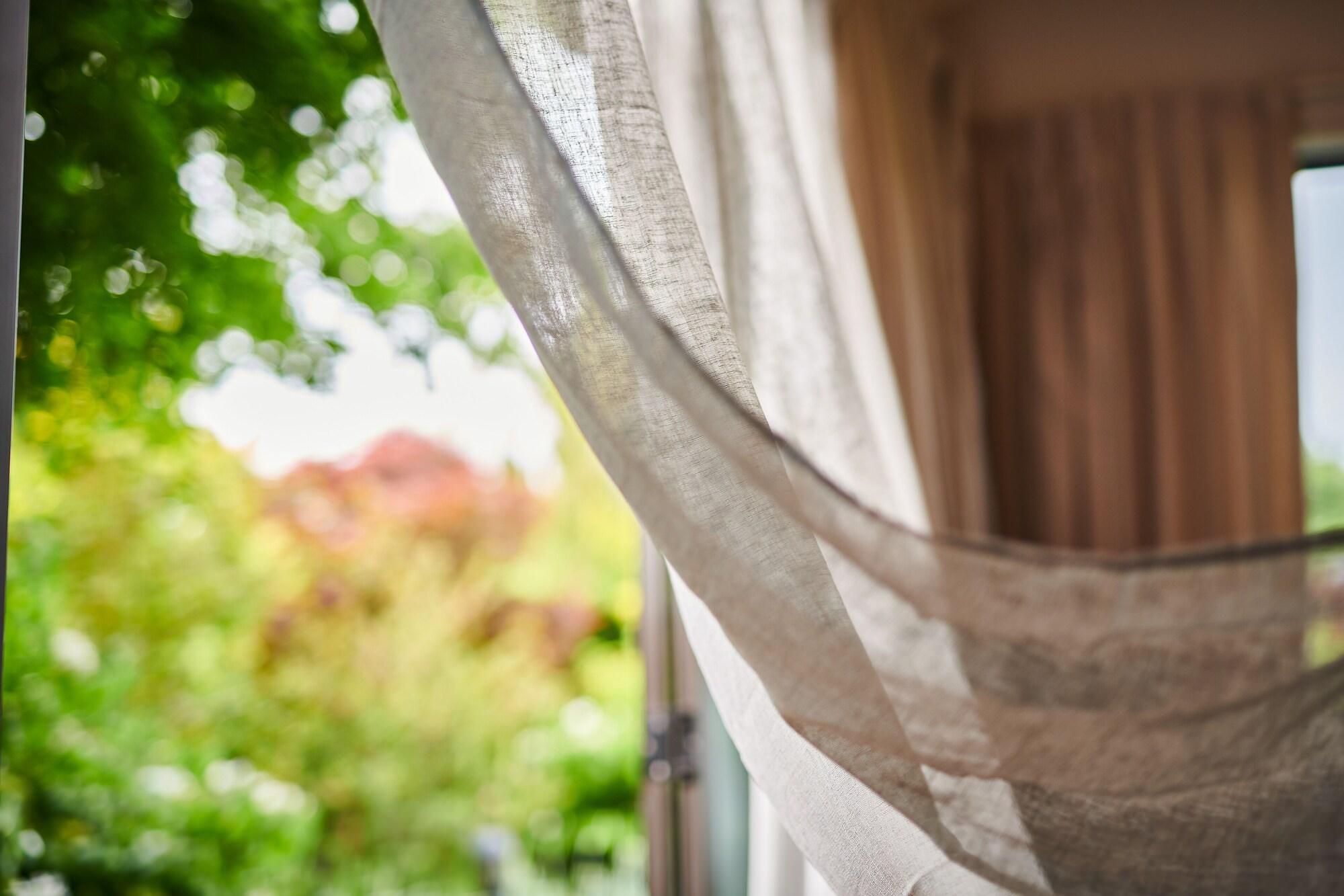Parehua Resort Martinborough Bagian luar foto A curtain
