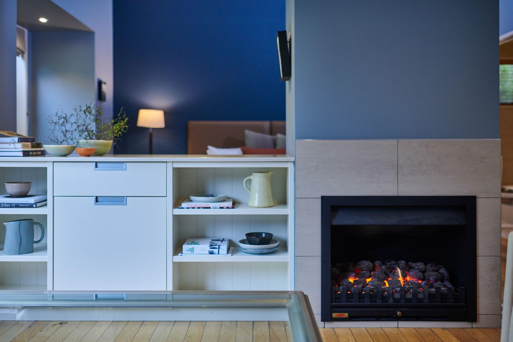 Parehua Resort Martinborough Bagian luar foto A gas fireplace